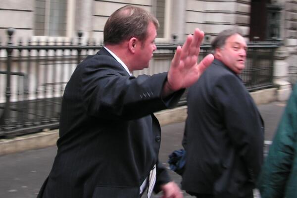 Steve Evans and John Blackwell leave the Court