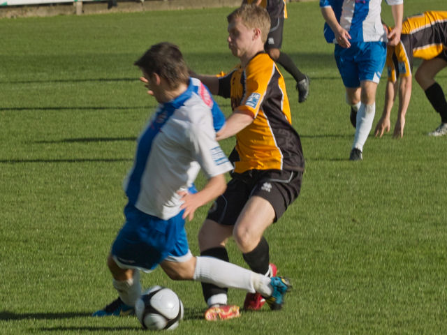 Jamie Yates goes for the ball