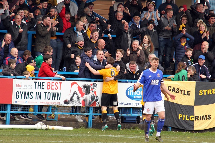 The Boston fans celebrate Dayle Southwell's opening goal